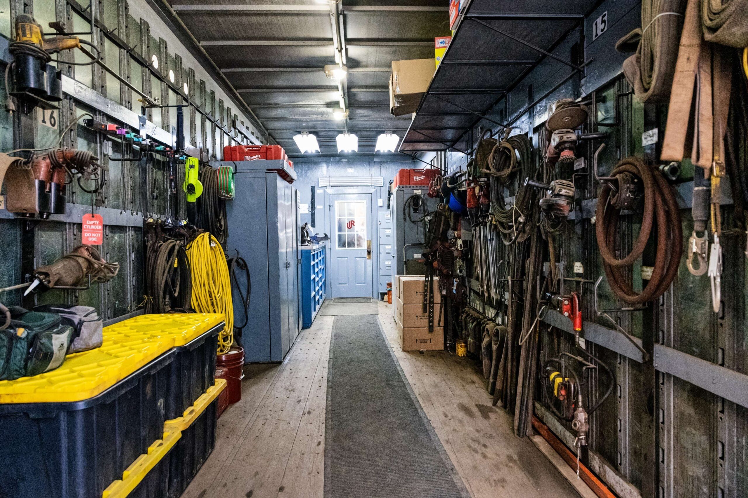 Interior walkway and equipment racks in a UIR trailer