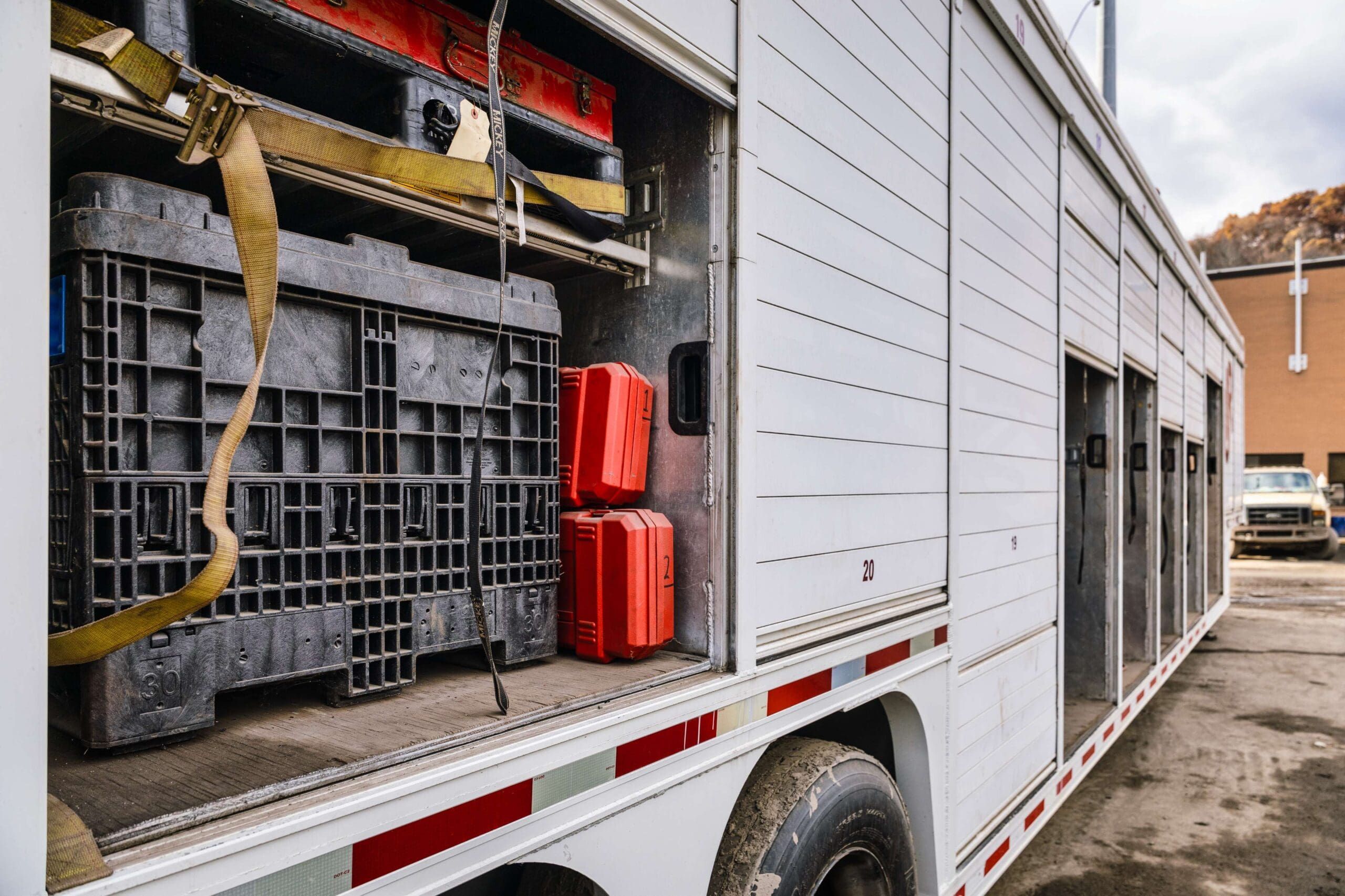 Tool storage accessible through a UIR trailer side door