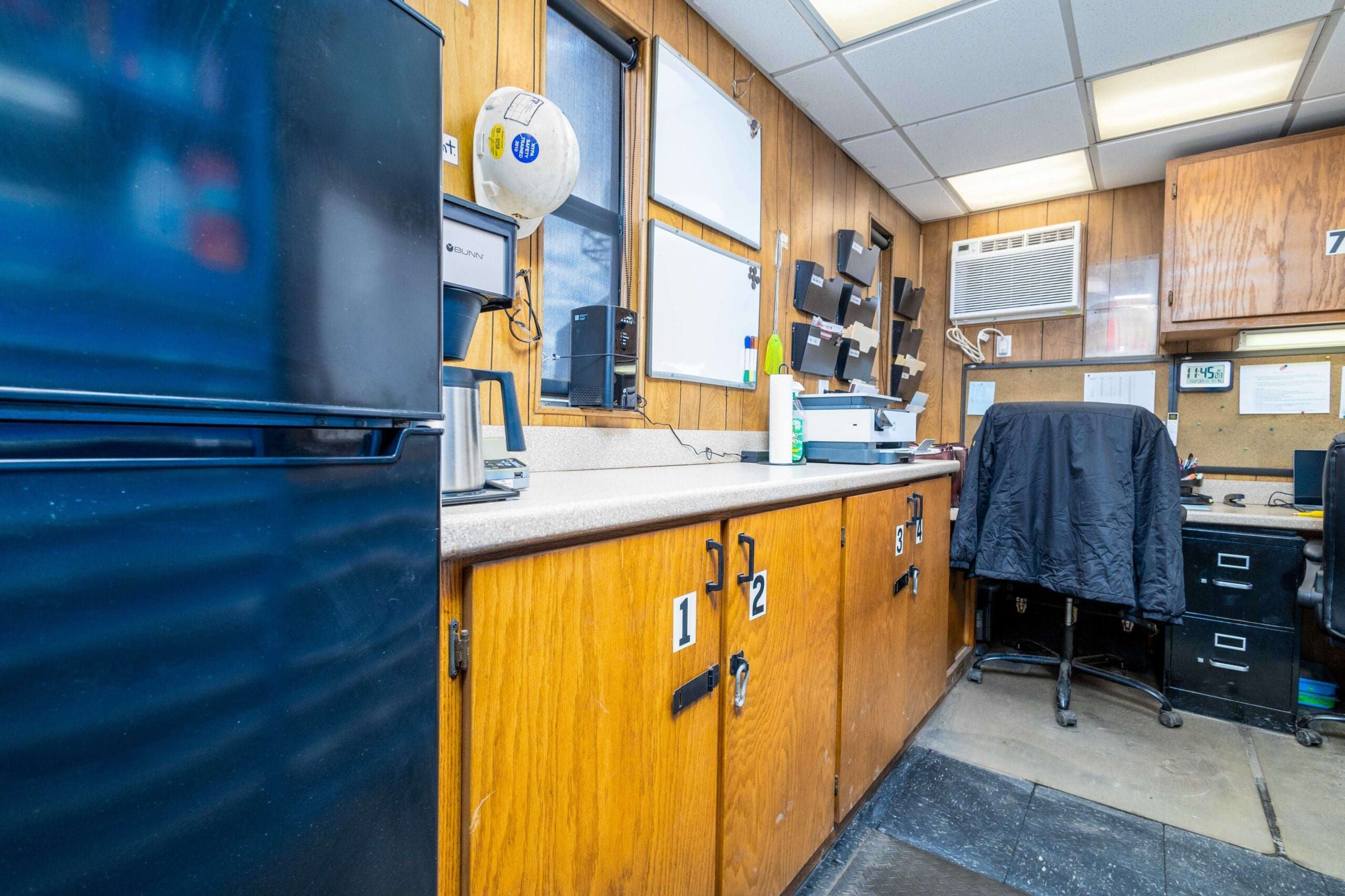Organized workshop with blue tool drawers